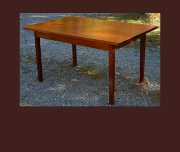 custom mahogany dining table with a single board top
