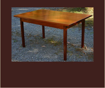 custom mahogany dining table with a single board top