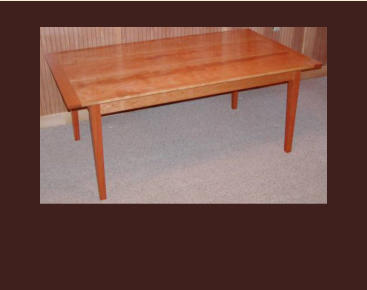 handmade shaker dining table in cherry with breadboard ends